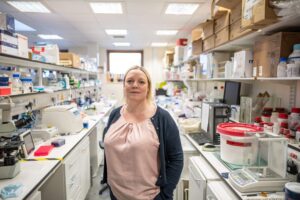 Charlotte Summers standing in a lab