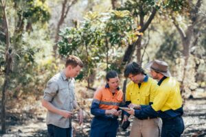 eam of scientific environmental conservationist working together collecting data.