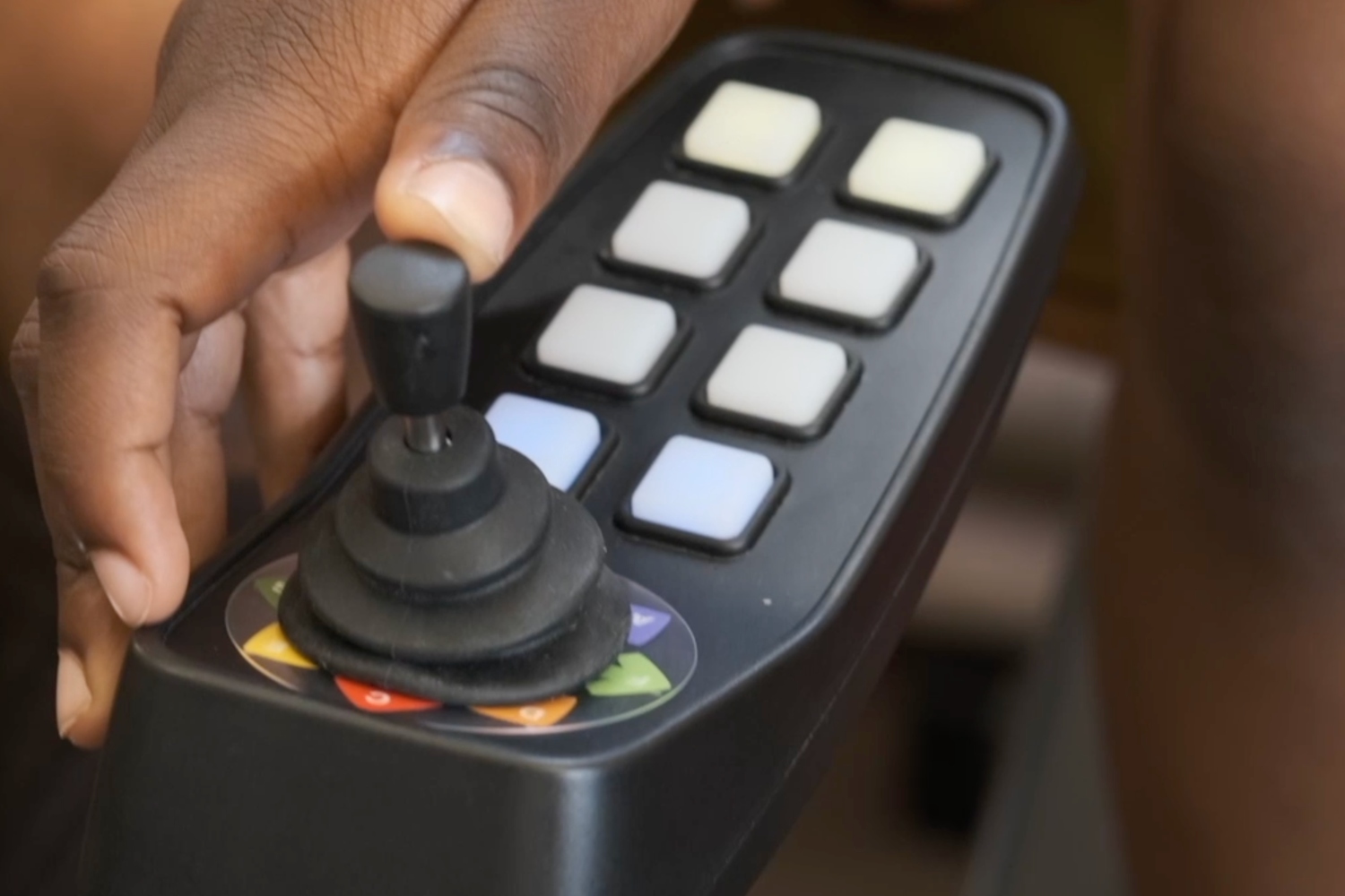 Closeup of someone using the Cmpsr MIDI controller.