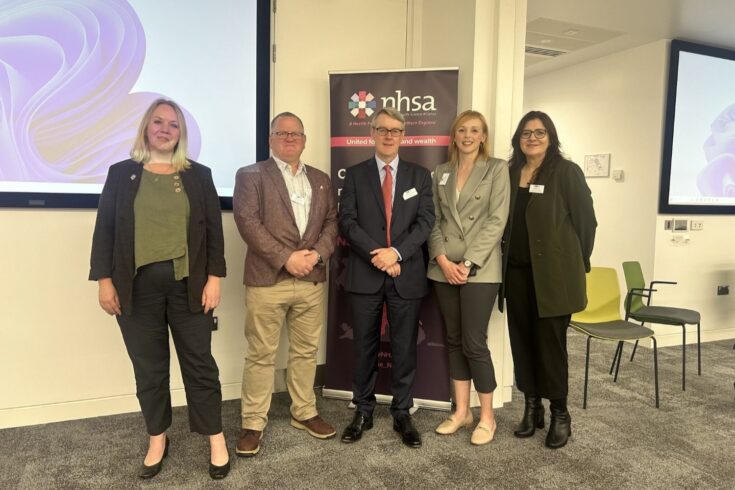 Patrick Chinnery standing with colleagues from the Northern Health Science Alliance.