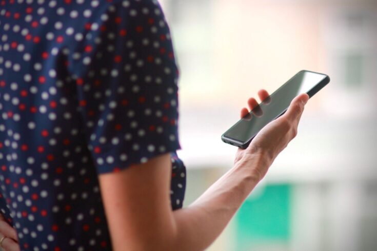 Closeup of a person using a smartphone