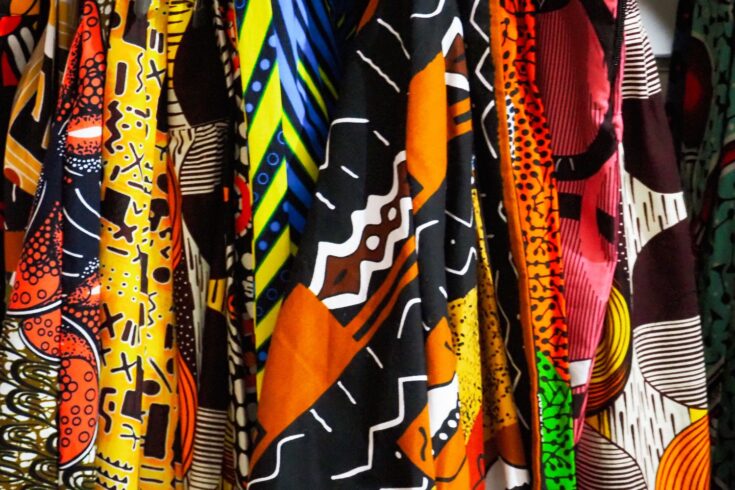 Brightly coloured patterned prints next to each other.