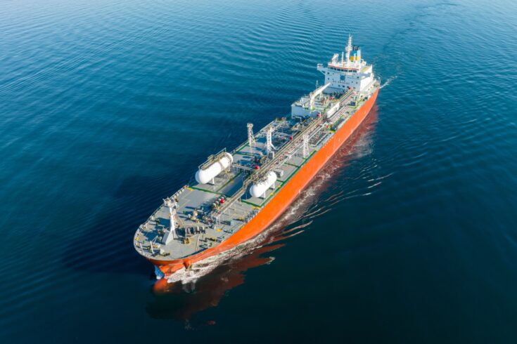 Aerial view of a gas tanker ship in the ocean.