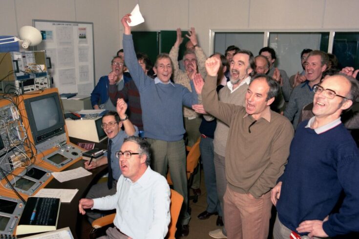 Photograph of a group of researchers cheering